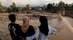 Indonesia searches for hundreds missing in deadly floods